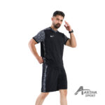 پیراهن و شورت طرح گل نایکی مشکی تن مانکن